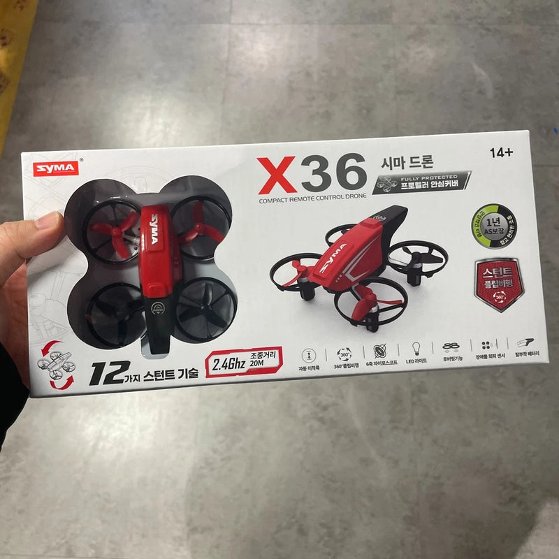 SYMA X36 mini quadcopter drone package with red and black drone illustration