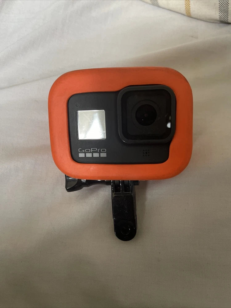 Orange and black waterproof action camera with GoPro logo and front lens