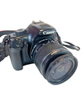 Black Canon DSLR camera with 18-55mm lens