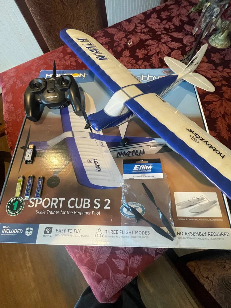 RC electric Sport Cub S2 airplane kit box with blue and white plane illustration