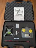 Quadcopter drone kit case with instruction manual, drone and controller