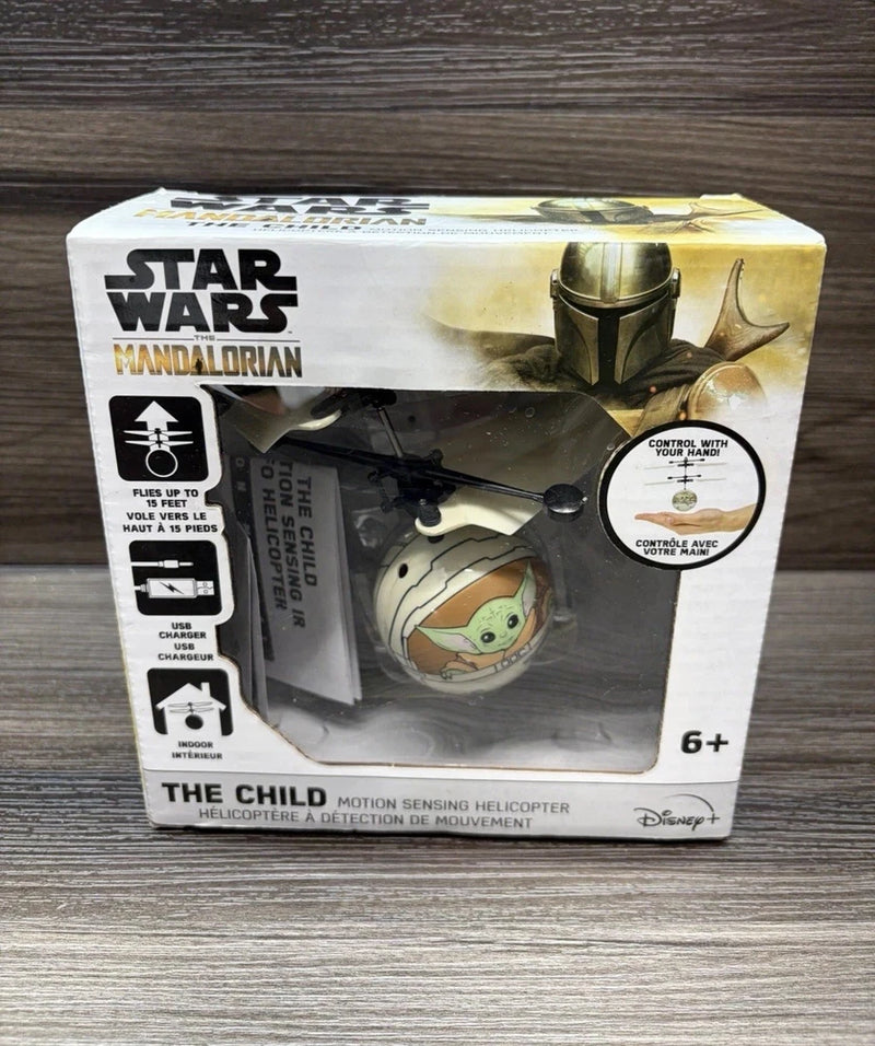 Boxed RC motion-sensing helicopter toy with The Child character, Star Wars Mandalorian