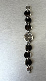 Fossil women's round black dial watch with stainless steel bracelet strap