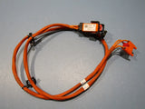 Genuine electric vehicle battery charging cable with orange cable and two connectors