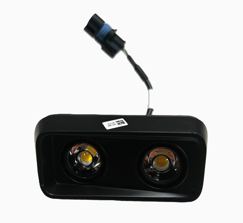 Auxiliary bottom light module, black housing with two circular lenses and attached cable