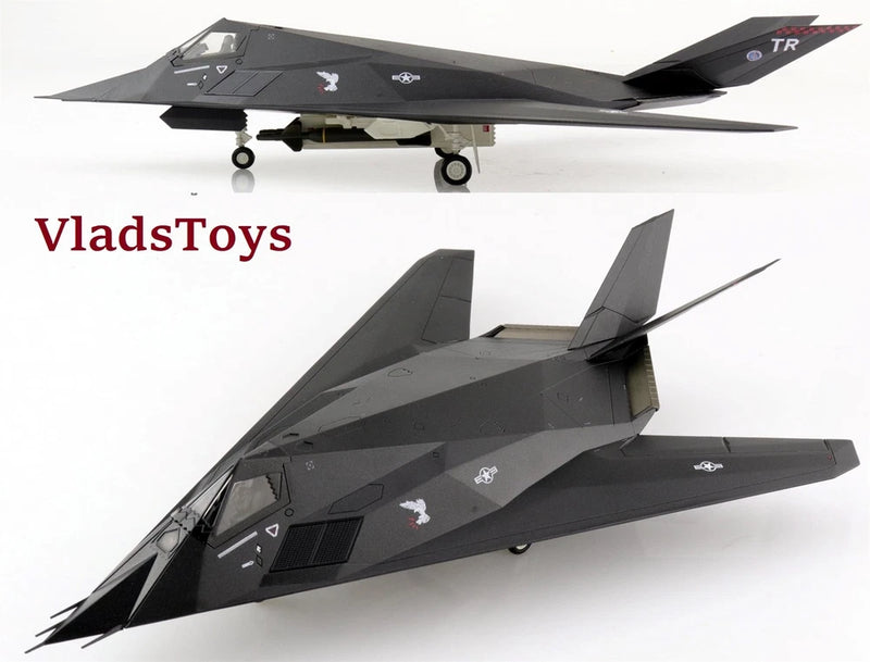 Dark gray F-117A Nighthawk stealth jet model, front and side angle views