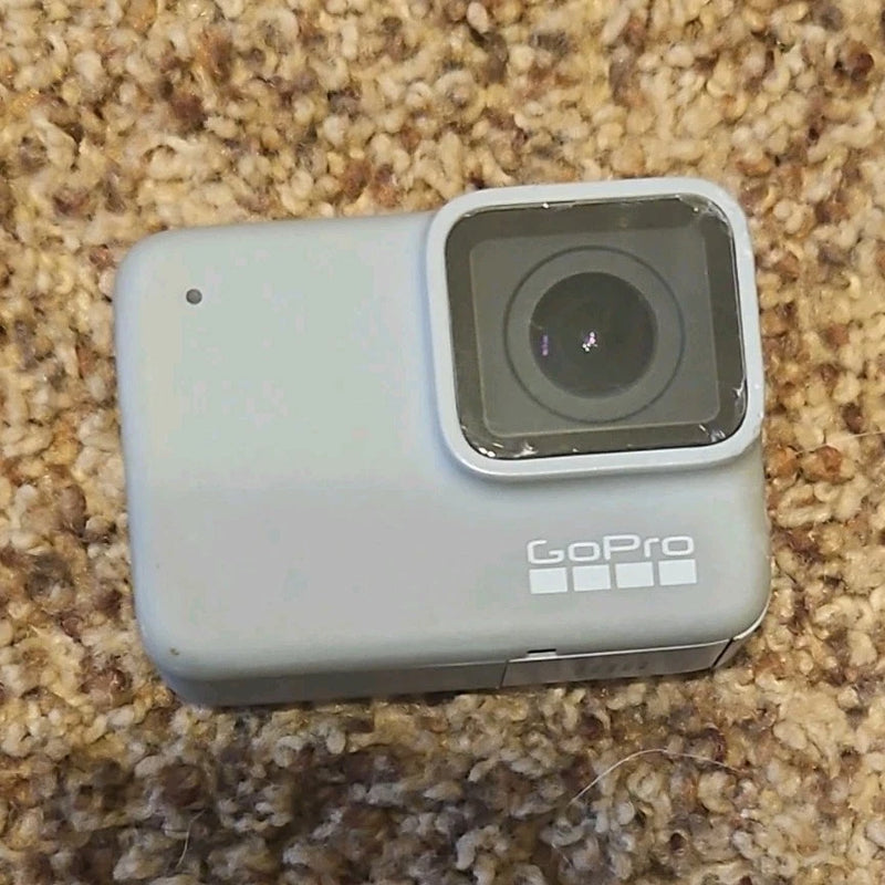 Silver GoPro HERO7 action camera with front lens and GoPro logo in waterproof housing