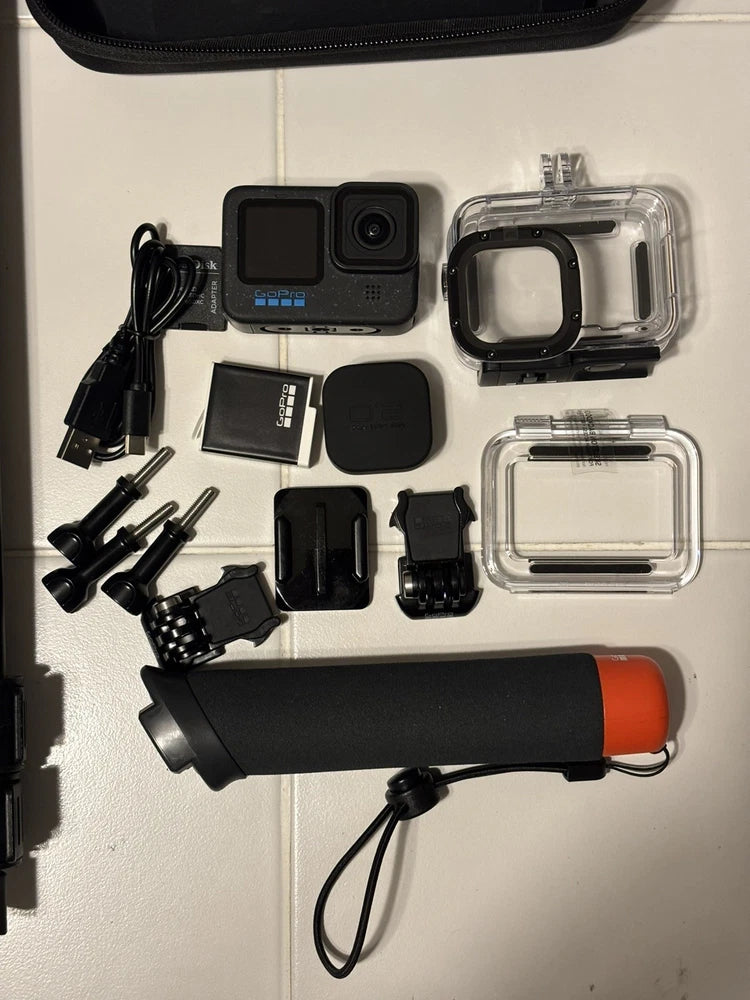 GoPro HERO12 Black action camera accessory bundle with camera, housing, mounts, battery