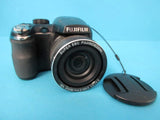 FUJIFILM FinePix compact digital camera in black with attached lens and wrist strap