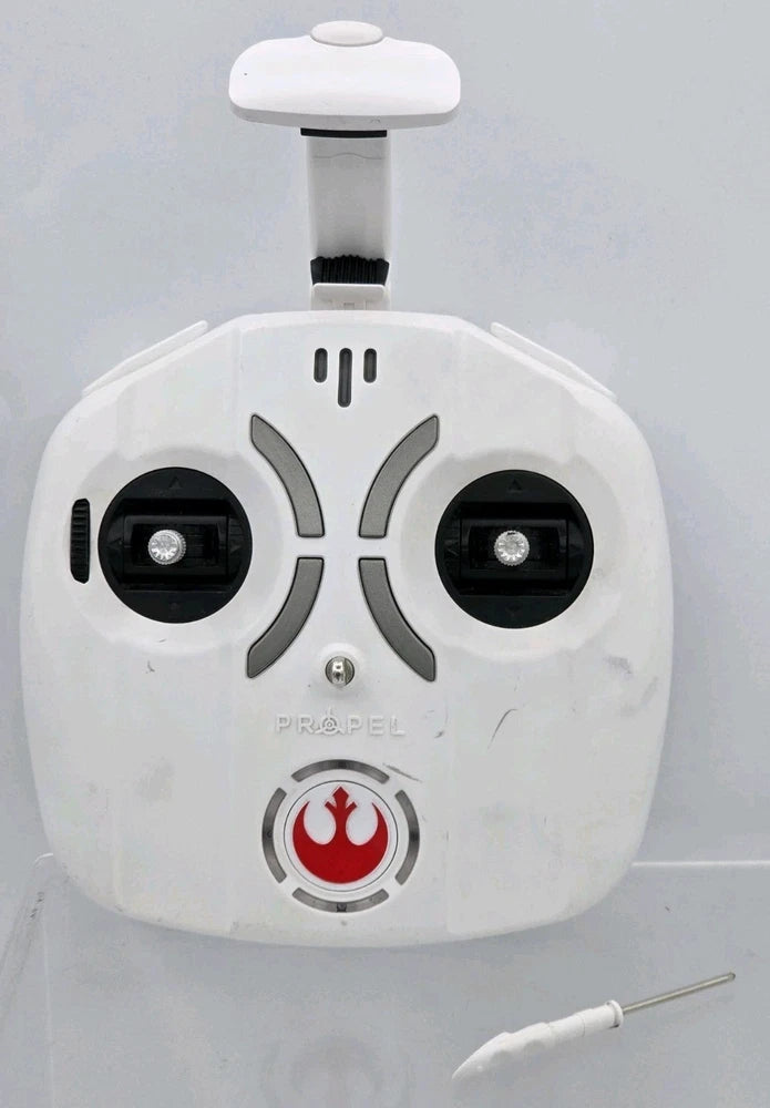 White drone remote controller with two thumb joysticks and circular flame button