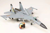 Scale model J-11A fighter jet with cockpit helmet accessory, light gray and gold