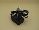 Black AC adapter with DC power plug and attached power cord