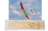 Laser-cut RC sailplane balsa and plywood parts in a wooden kit tray