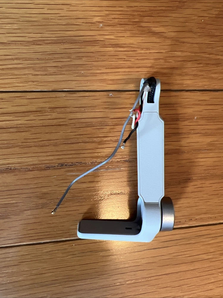 Drone arm shell replacement with motor and wiring, light gray metal bracket
