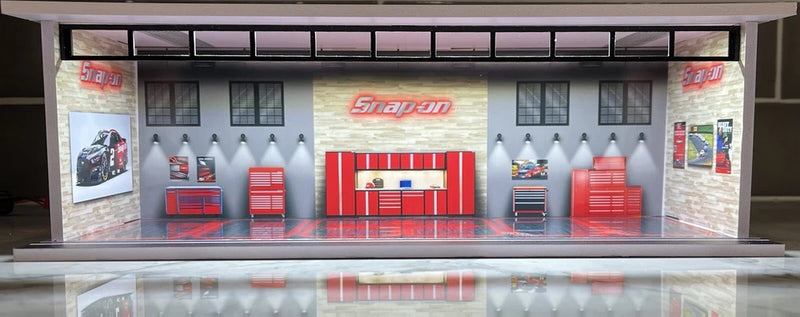 1:64 model garage diorama with Snap-on sign and red tool workstations