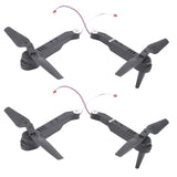 Drone motor spare parts set with four black propellers and attached wiring harness
