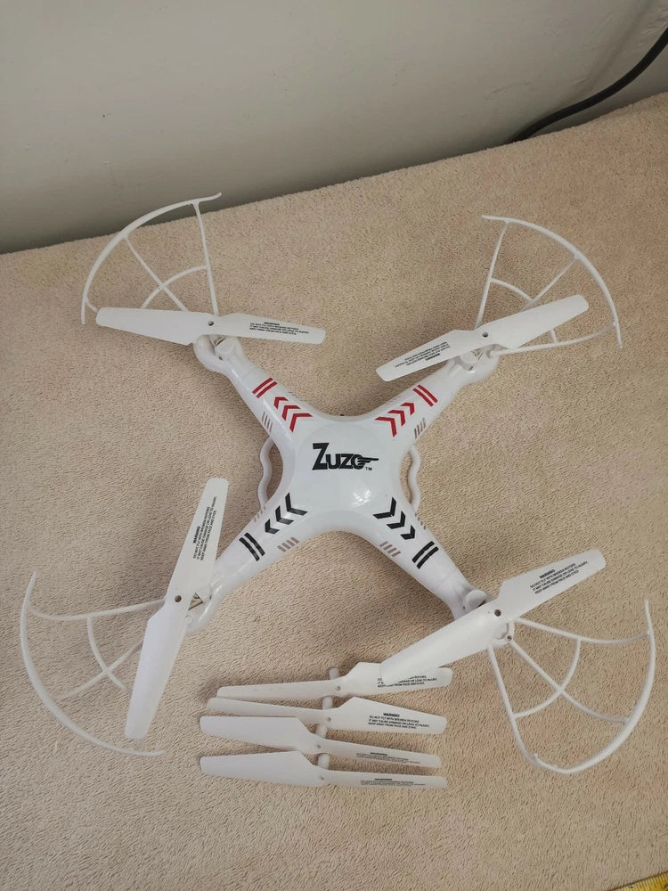 Zuzo Technology 6-axis quadcopter drone, white with four propellers and camera housing
