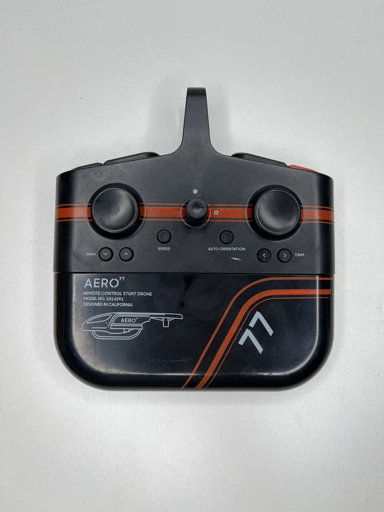 Black RC remote controller with two joysticks and orange Aero 7 graphics, compact handheld