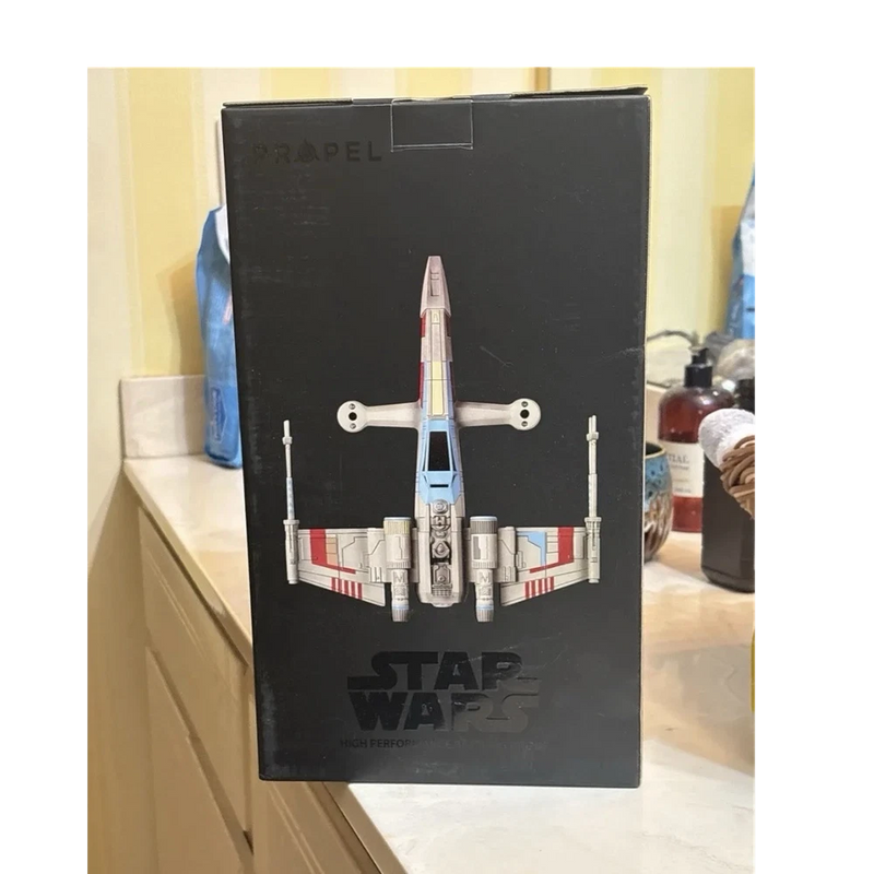 Propel electric quadcopter drone retail box with multicolor X-Wing graphic, STAR WARS logo