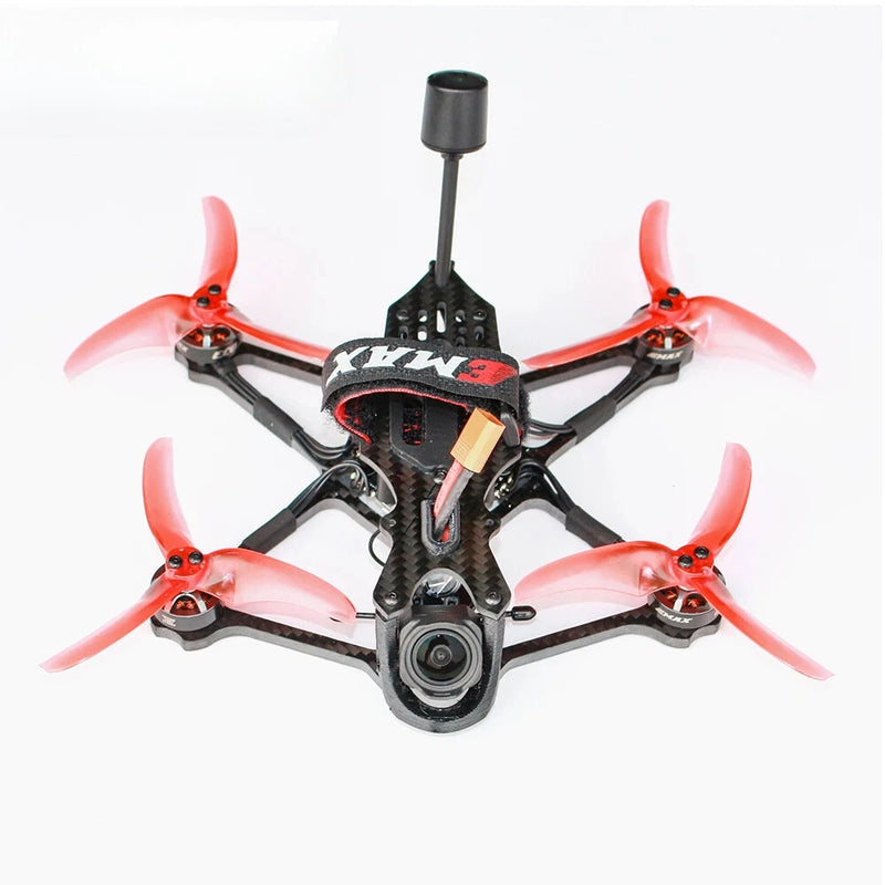 FPV quadcopter drone with black carbon frame, red propellers, and front camera