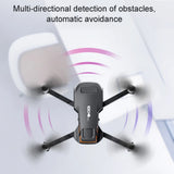 Black quadcopter drone with four rotors and front camera sensor module