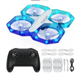 Mini LED quadcopter drone with blue prop lights, plus remote controller and spare propellers