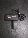 AC power adaptor with attached cord and battery pack connector