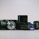 Black Panasonic Lumix digital camera kit with battery and 32GB SD card