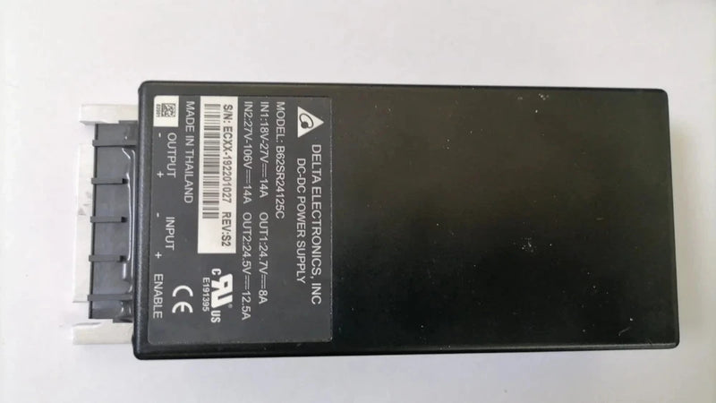 Delta DC/DC converter with black metal case and side label, compact power module