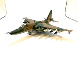 Camo military jet model with red star and '17' markings