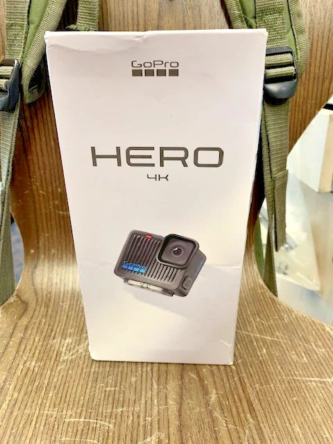 GoPro HERO 4K action camera box showing compact black camera with front lens