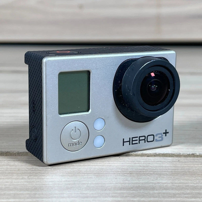 Silver action camera with front LCD screen, round lens, and HERO3+ branding