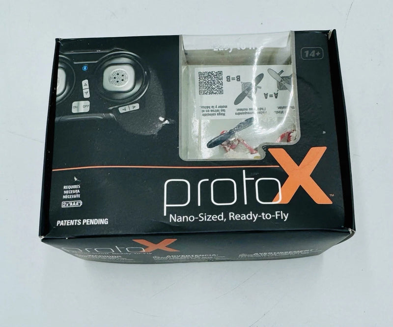 Proto X Nano FPV quadcopter open box with transmitter and drone parts