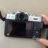 Fujifilm X-T20 mirrorless camera body with lens and rear LCD screen, black