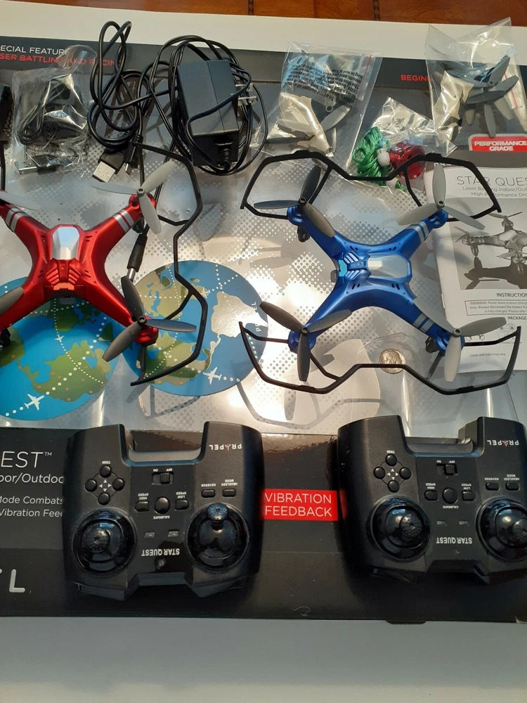 Red and blue RC laser battling drone set with two wireless controllers, vibration feedback