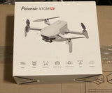 Potensic ATOM SE GPS 4K quadcopter drone with foldable white propellers on box