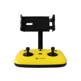 Yellow remote controller with two joysticks and phone holder