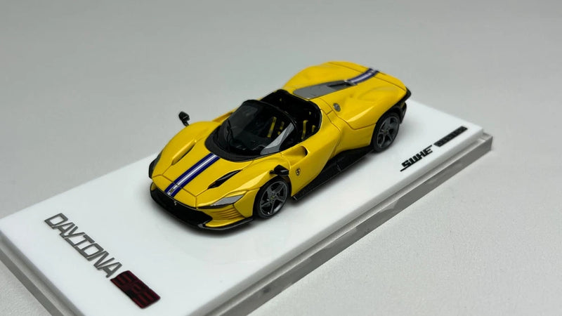 Yellow SUHE 1:64 Ferrari SP3 resin car model with black roof and racing stripes on base