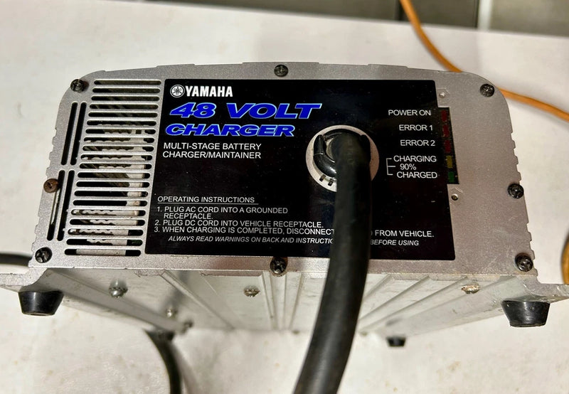 Yamaha 48-volt battery charger with power indicator and charging cable