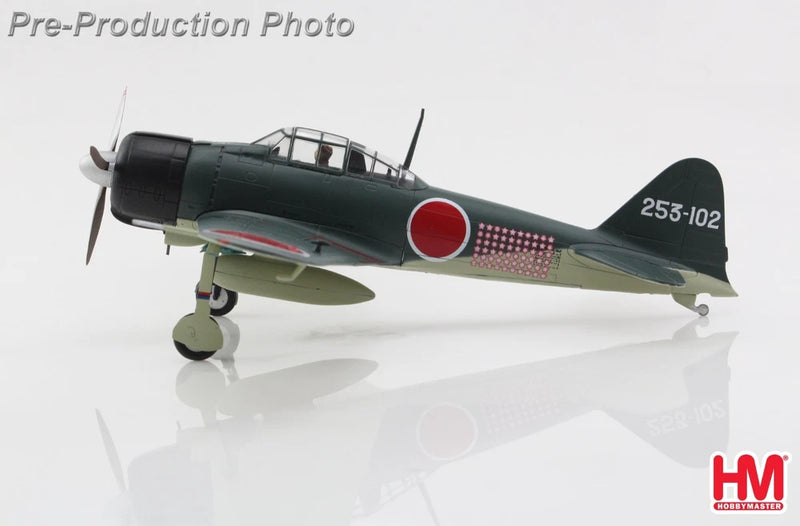 Hobby Master Zero fighter model airplane in dark green with red roundel, landing gear down