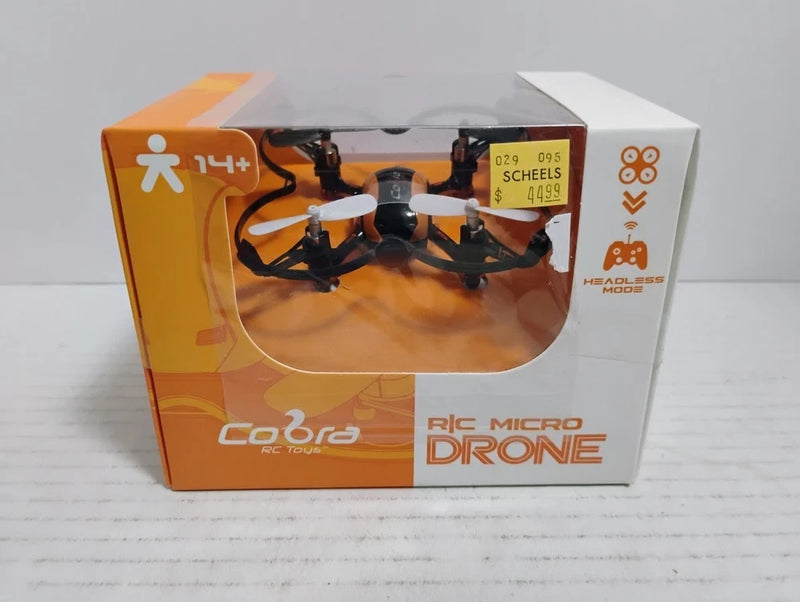 Micro RC drone toy in retail box with clear window and Cobra branding