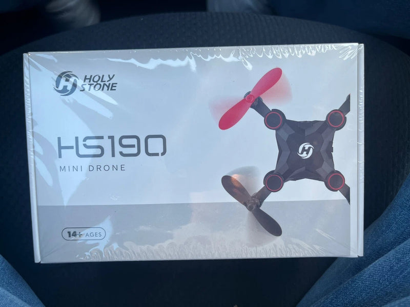 Mini RC quadcopter pocket drone box packaging with illustrated quadcopter