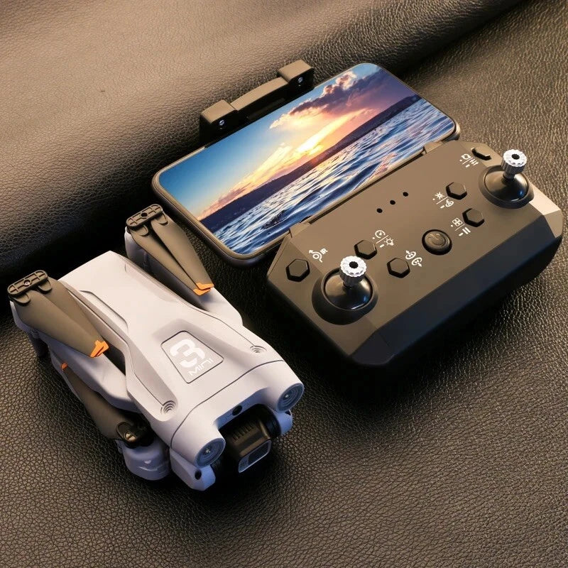 Dual-camera 4K drone with gray body and black controller with phone screen