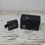 AKASO EK7000 action camera in black with 4K Ultra HD lens and accessory block