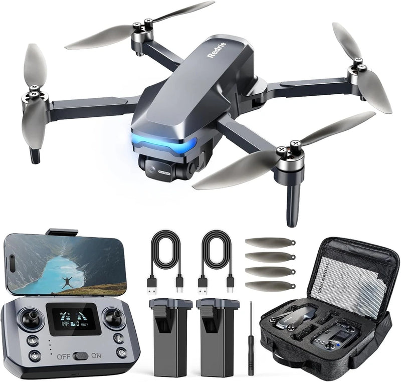 Black quadcopter drone with camera, propellers and controller, plus batteries and carrying case