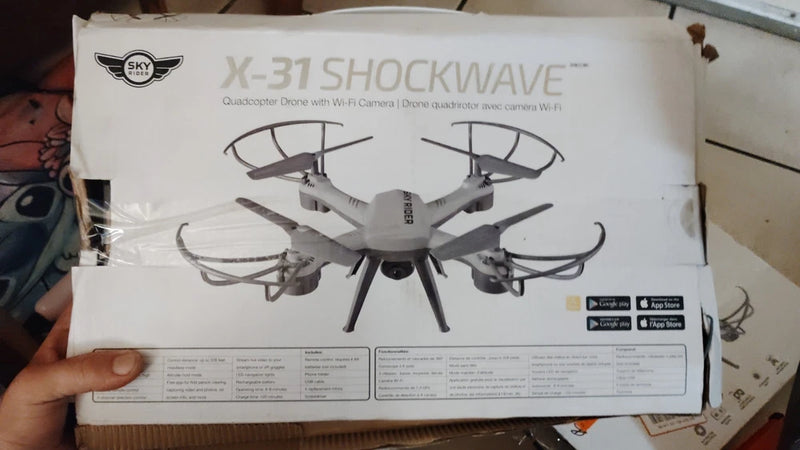 Sky Rider quadcopter drone box with white four-rotor illustration