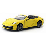 1:32 Porsche 911 Carrera yellow diecast model car, front-left view