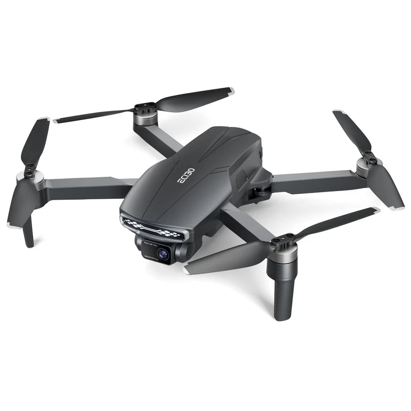 Black quadcopter drone with camera, four foldable rotors and front lens.