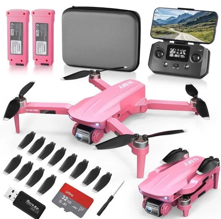 Pink quadcopter drone with built-in camera, controller, spare props, battery, and 32GB TF card