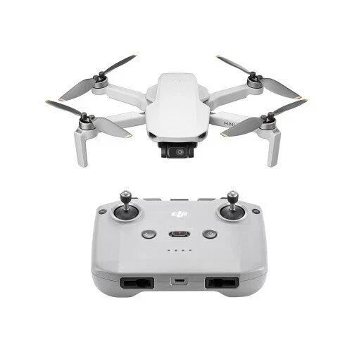 White quadcopter camera drone with 4 propellers and detachable controller